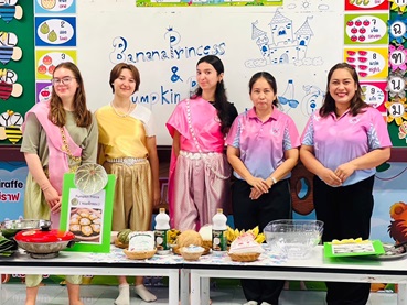 students standing in front of whiteboard