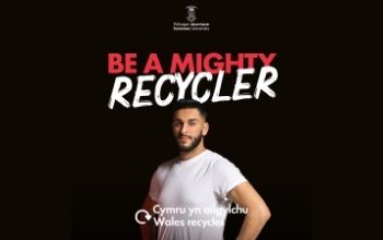 Be Mighty Recycle Campaign poster showing young man in white t shirt against a black background