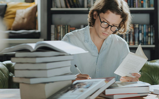 A student reading in a library