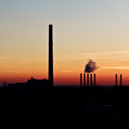 Smoking chimneys at sunset