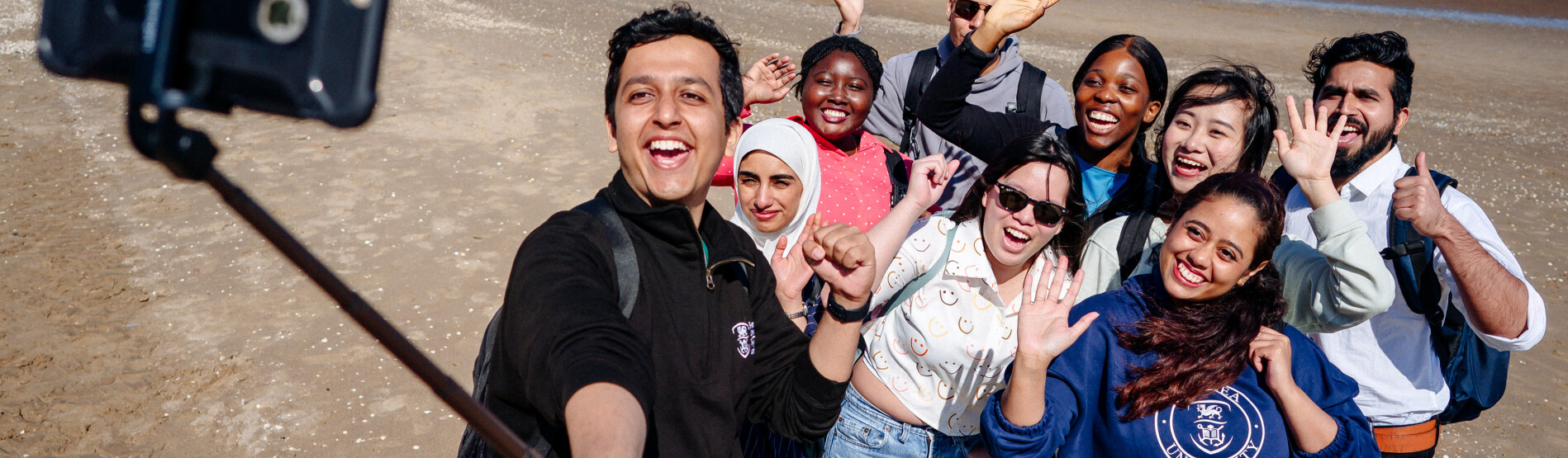 International students on the beach