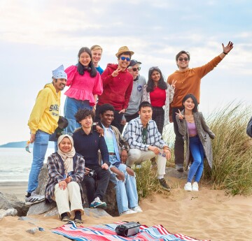 International students at the beach