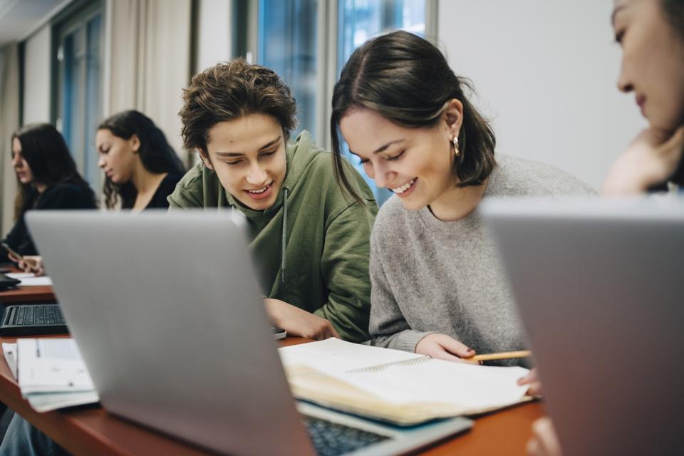Students on a laptop. 