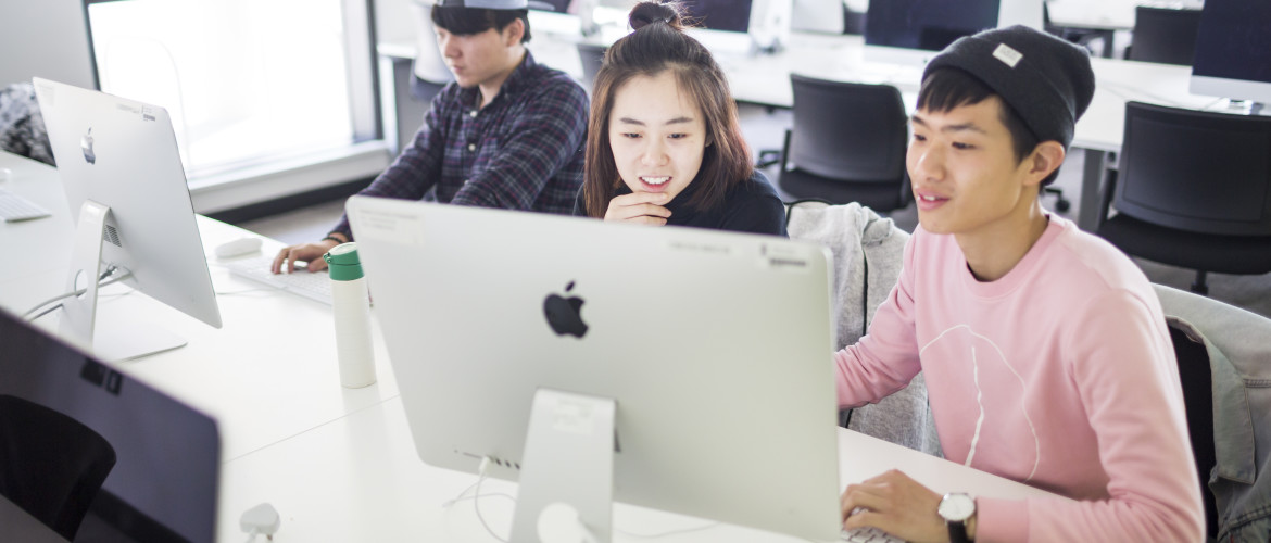 two students on a computer