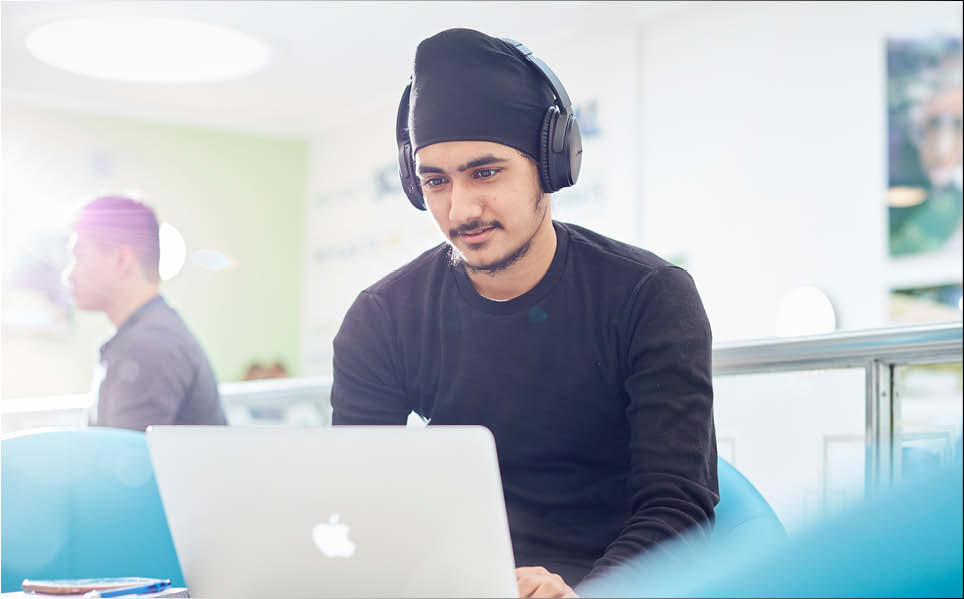 Student looking at a laptop