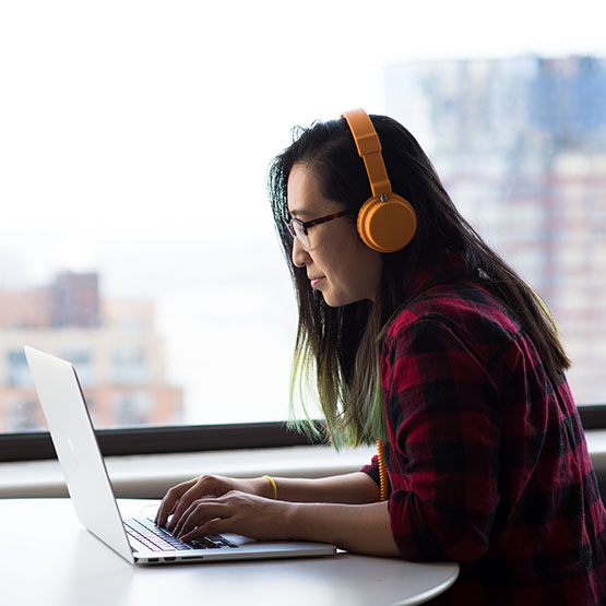 girl on laptop performing remote user test