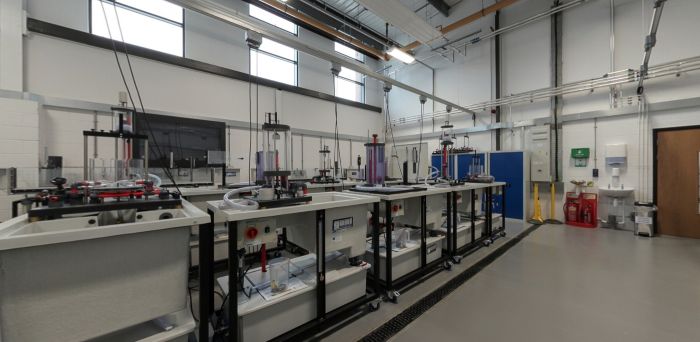 Fluid dynamics laboratory with experimental testing rigs and research equipment