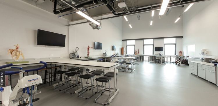 Exercise physiology laboratory with testing equipment and teaching stations
