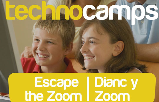 Technocamps. Family around laptop