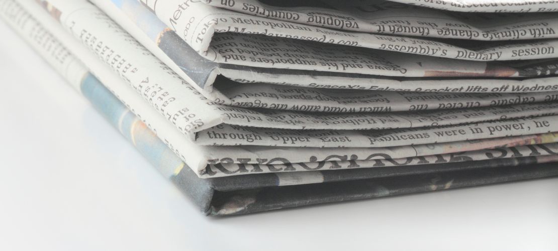 Stacked Newspapers