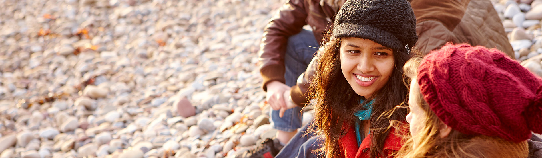 Students enjoying Swansea Bay beach.